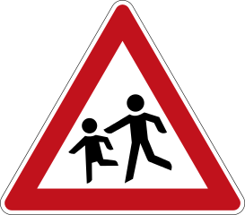 Spielende Kinder und Straßenverkehr – Bild 1 von 2